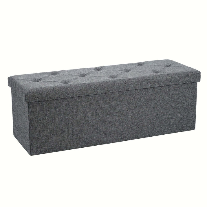 Gray storage ottoman bench with tufted top and spacious interior for organized storage.