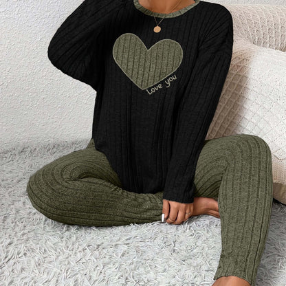 plus size heart fitted loungewear in black and green with heart graphic and text 'Love you'.