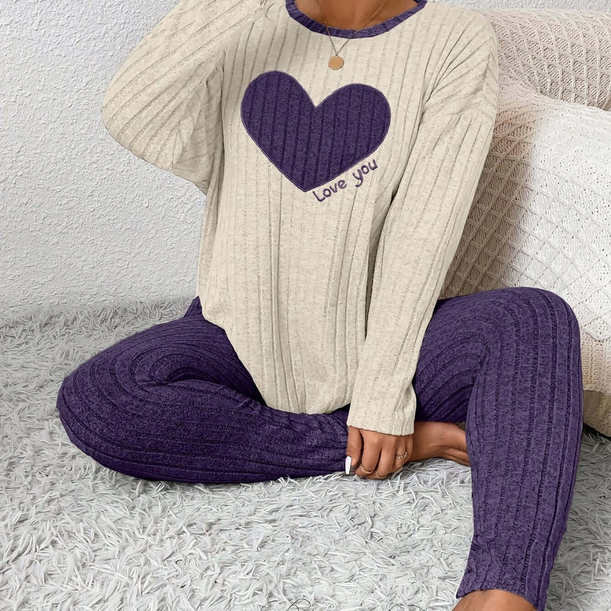 plus size heart fitted loungewear featuring a cozy sweater with heart design and matching leggings.