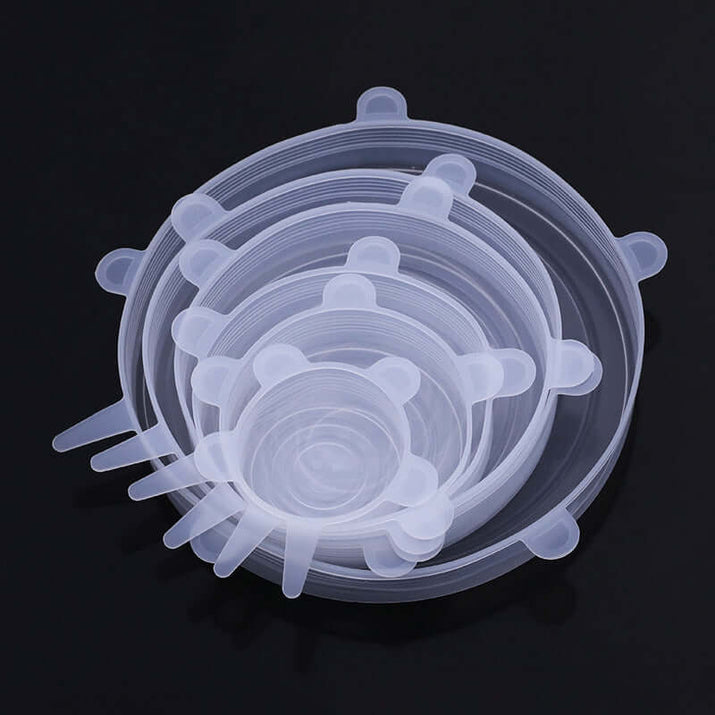 Set of silicone food storage covers in various sizes for versatile kitchen use.