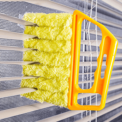 Washable window cleaning brush featuring a fluffy yellow head for effective cleaning of window blinds.