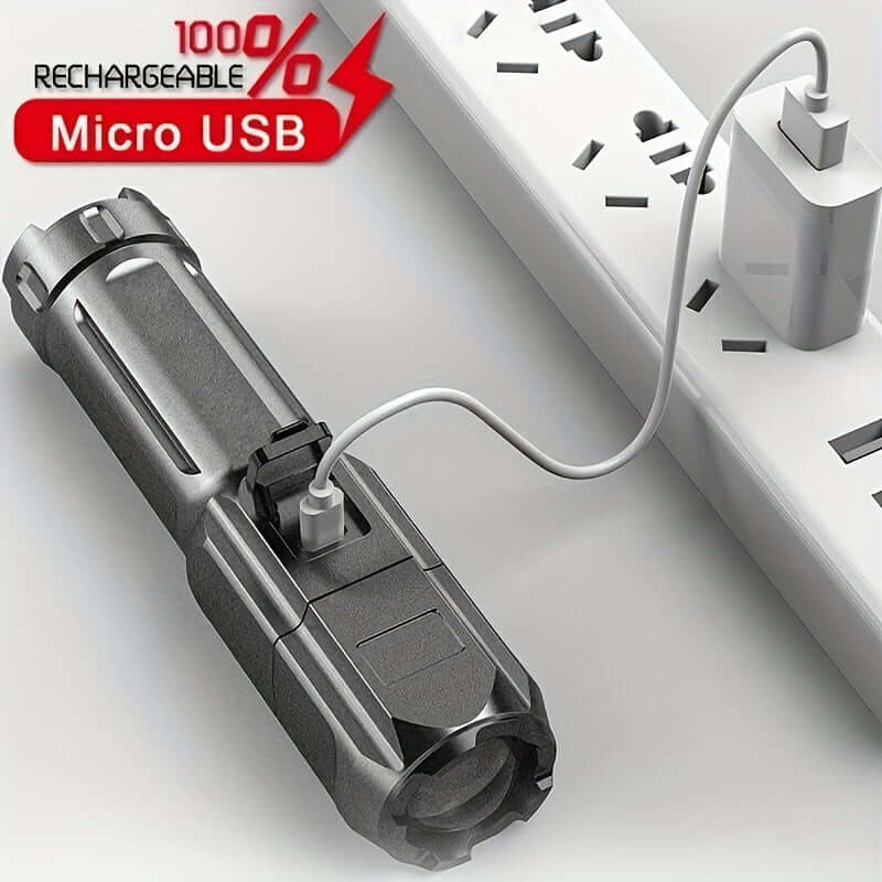 High-power zoom flashlight charging via Micro USB, showcasing its sleek design and powerful functionality.