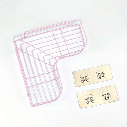Pink wire cast iron shower shelf with two wall mounting brackets.