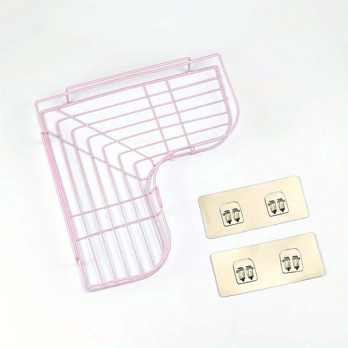 Pink wire cast iron shower shelf with two wall mounting brackets.