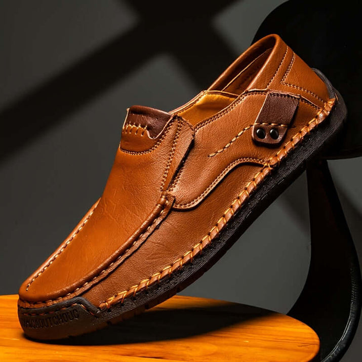 men's slip-on loafers in brown leather with a stylish design, perfect for casual wear.