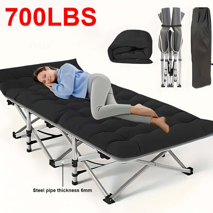 A person relaxing on a portable folding guest bed, showcasing its comfort and portability, with a sturdy design.