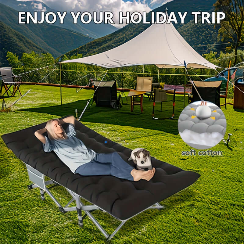 Portable folding guest bed with soft cotton mattress for comfortable outdoor relaxation.