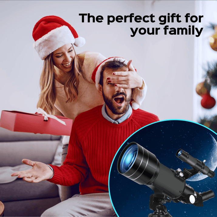A woman surprises a man wearing a portable 150X telescope with tripod during the holidays.