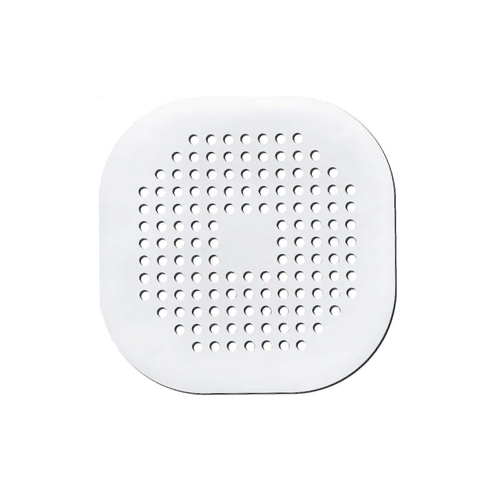 White silicone drain protector for bathroom kitchen with multiple holes for effective drainage.