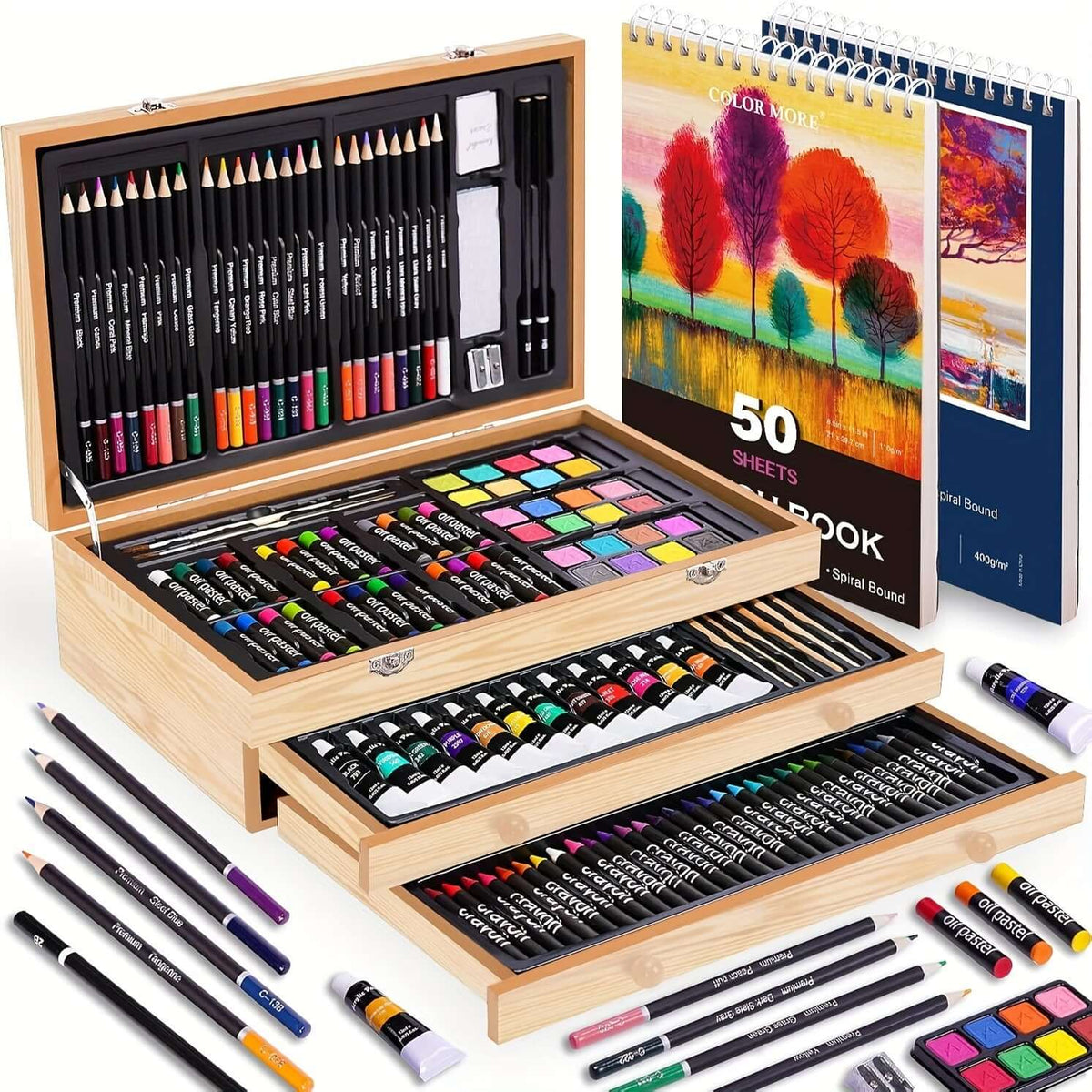 PASAMIC non-toxic art supplies in a wooden box with colored pencils, paints, and sketchbooks.