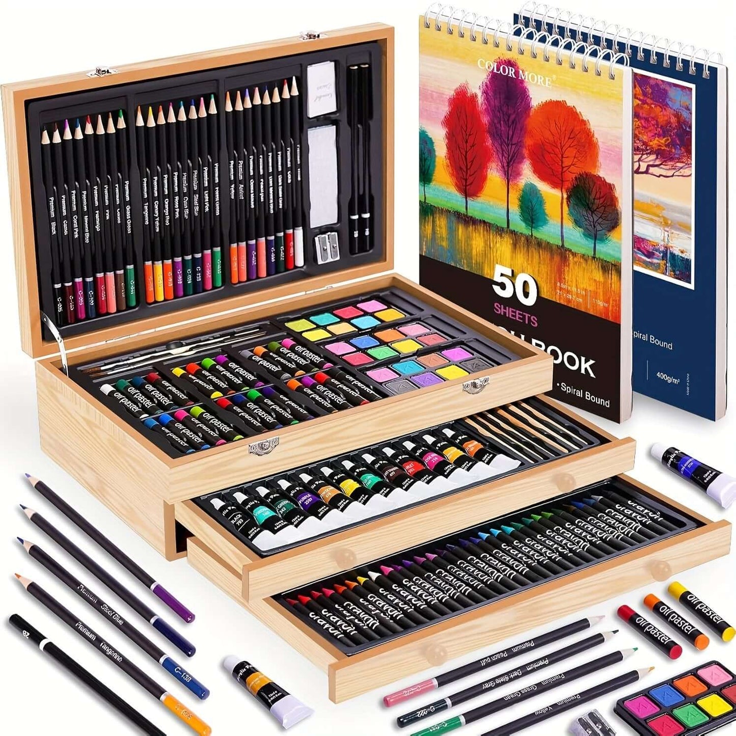 PASAMIC non-toxic art supplies in a wooden box with colored pencils, paints, and sketchbooks.