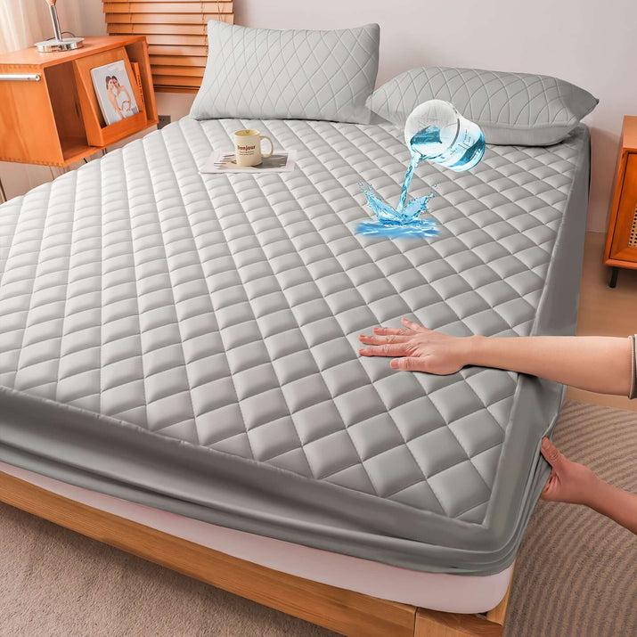 Ultrasonic embossed polyester fabric specifications on a mattress protector with water resistance feature.