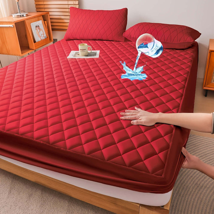 Hand demonstrating the water-resistant feature of ultrasonic embossed polyester fabric specifications mattress cover.