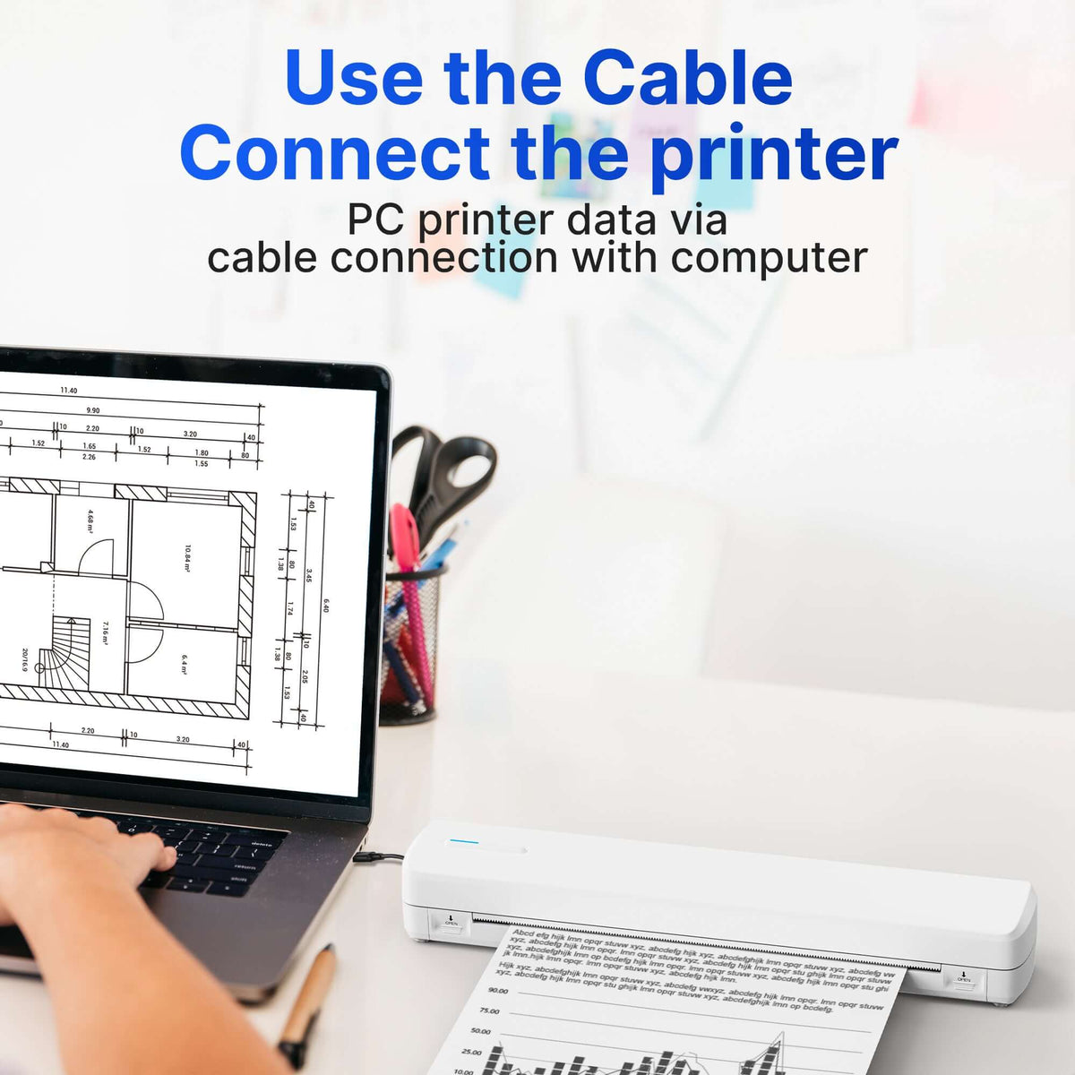 User connecting a portable wireless travel printer to a computer via cable, showcasing printer data transfer.