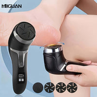 electric foot callus remover for dead skin being used on a foot to remove calluses with interchangeable tips.