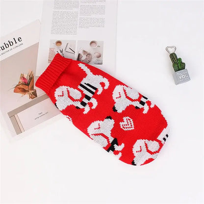 Cute cat sweater costume featuring a red design with playful white cat patterns on a cozy knit material.