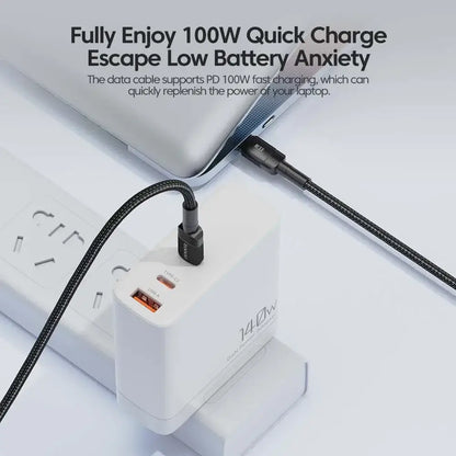 100W Type C to Type C charging cable connected to a fast charger, illustrating quick charge capabilities.