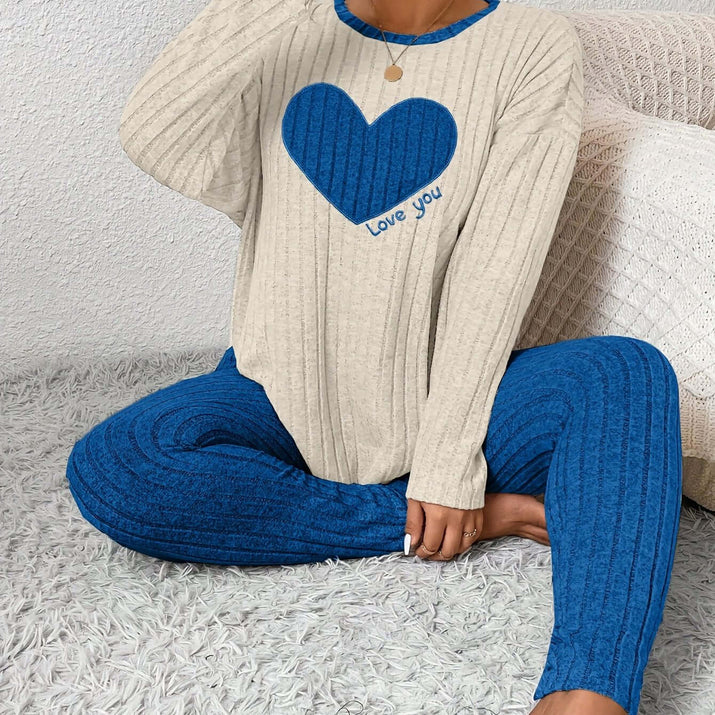 plus size heart fitted loungewear featuring a blue heart design on a cozy top and matching pants.