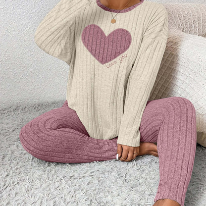 Stylish plus size heart fitted loungewear featuring a heart graphic in cozy fabric, perfect for relaxation and comfort.