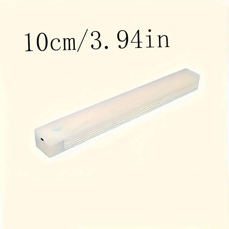 wireless LED under cabinet light measuring 10cm/3.94in, providing bright illumination for kitchen spaces.