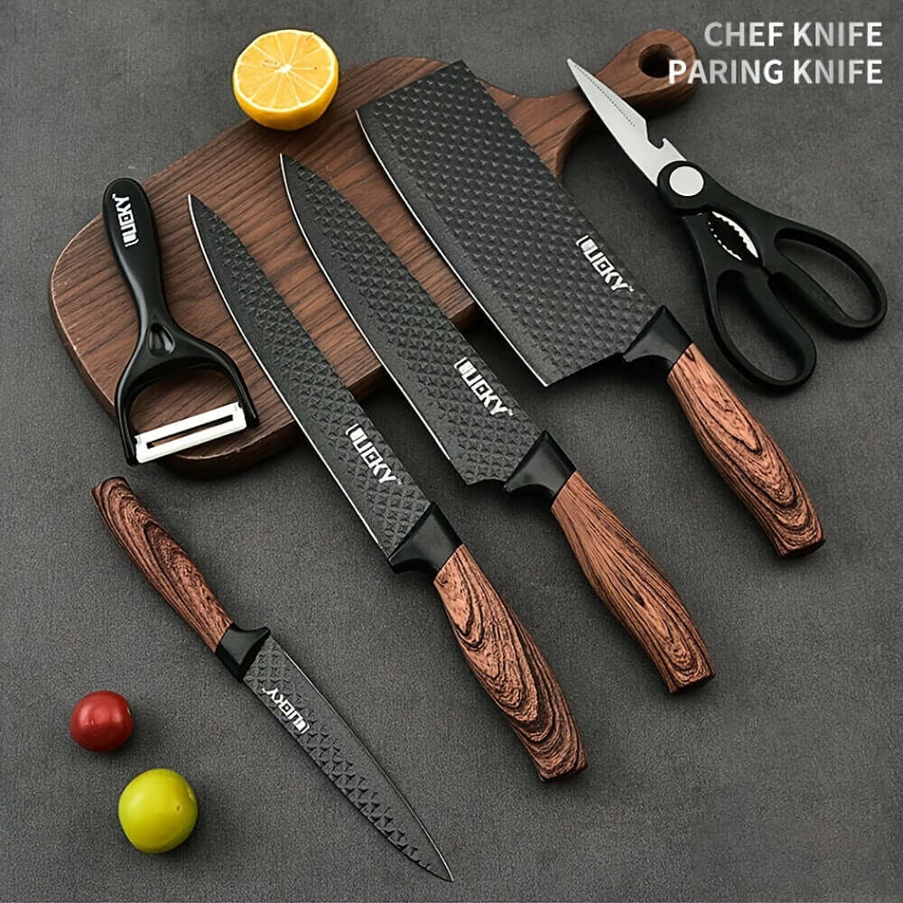 Professional kitchen knife set featuring chef knife, paring knife, scissors, and peeler on a wooden cutting board.