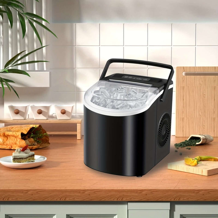 portable ice maker with handle in kitchen, producing ice with modern design on countertop.