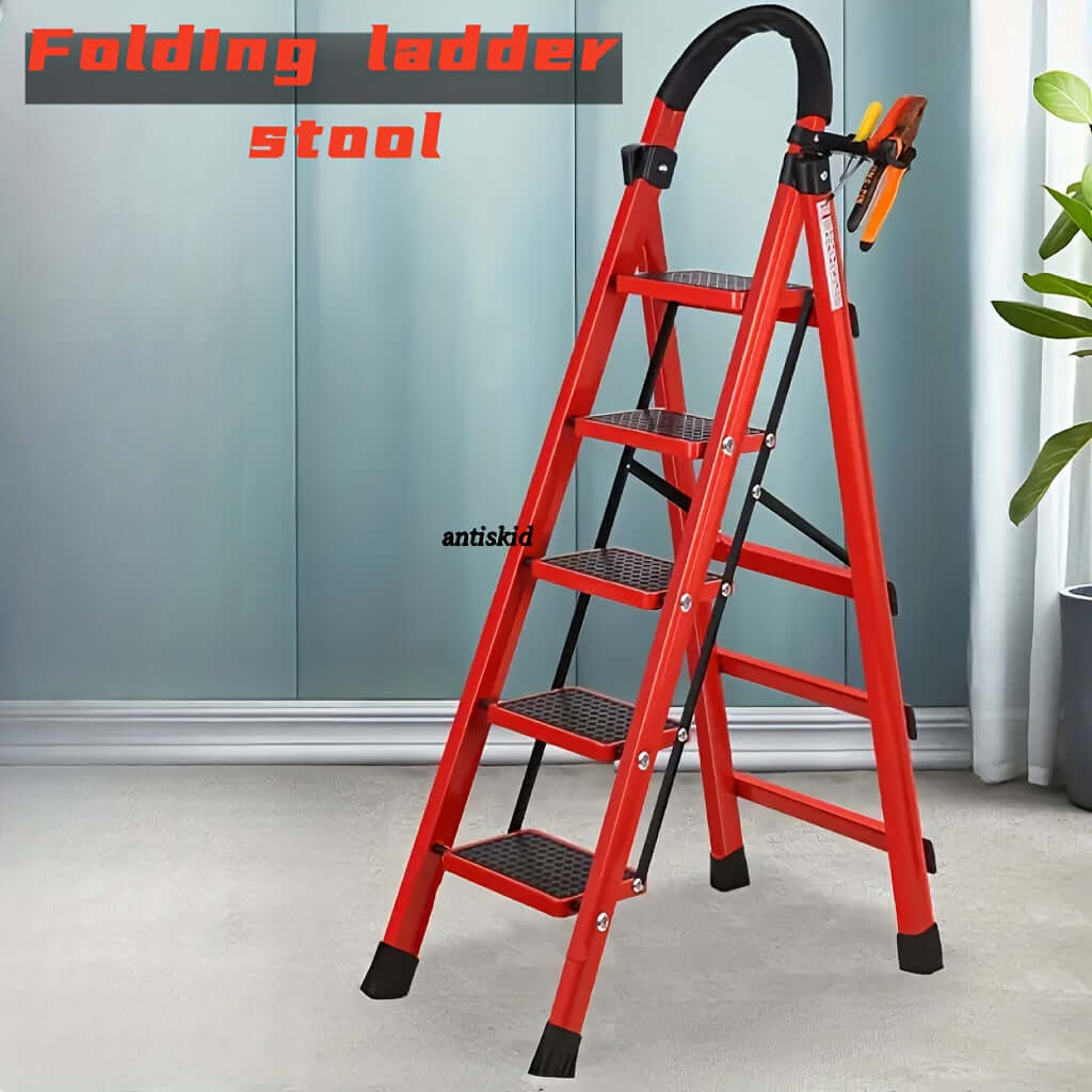 Heavy-duty portable folding ladder in red, offering sturdy support and versatility for various tasks.