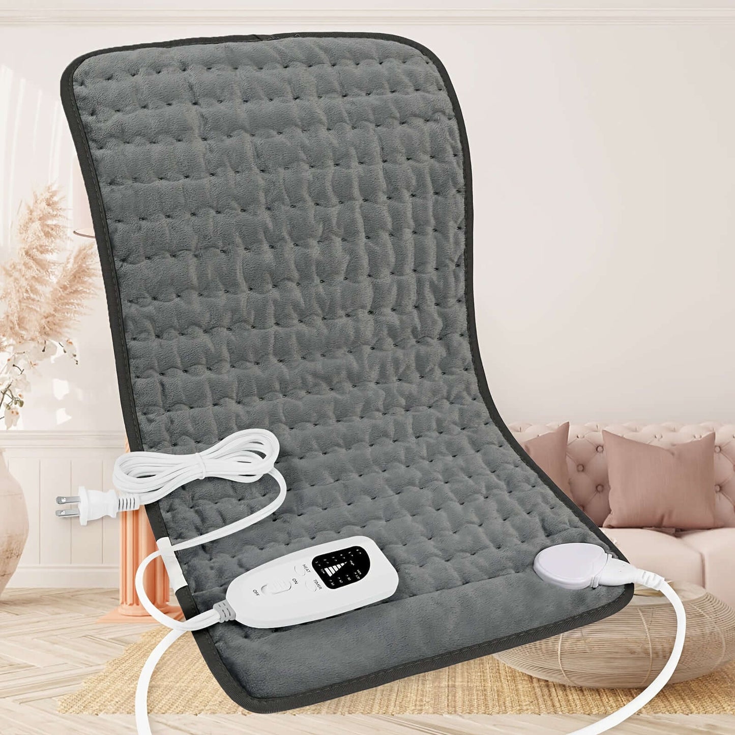 extra large electric heating pad in gray with adjustable control for pain relief and comfort.